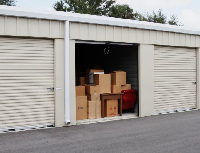 Open storage unit full of boxes
